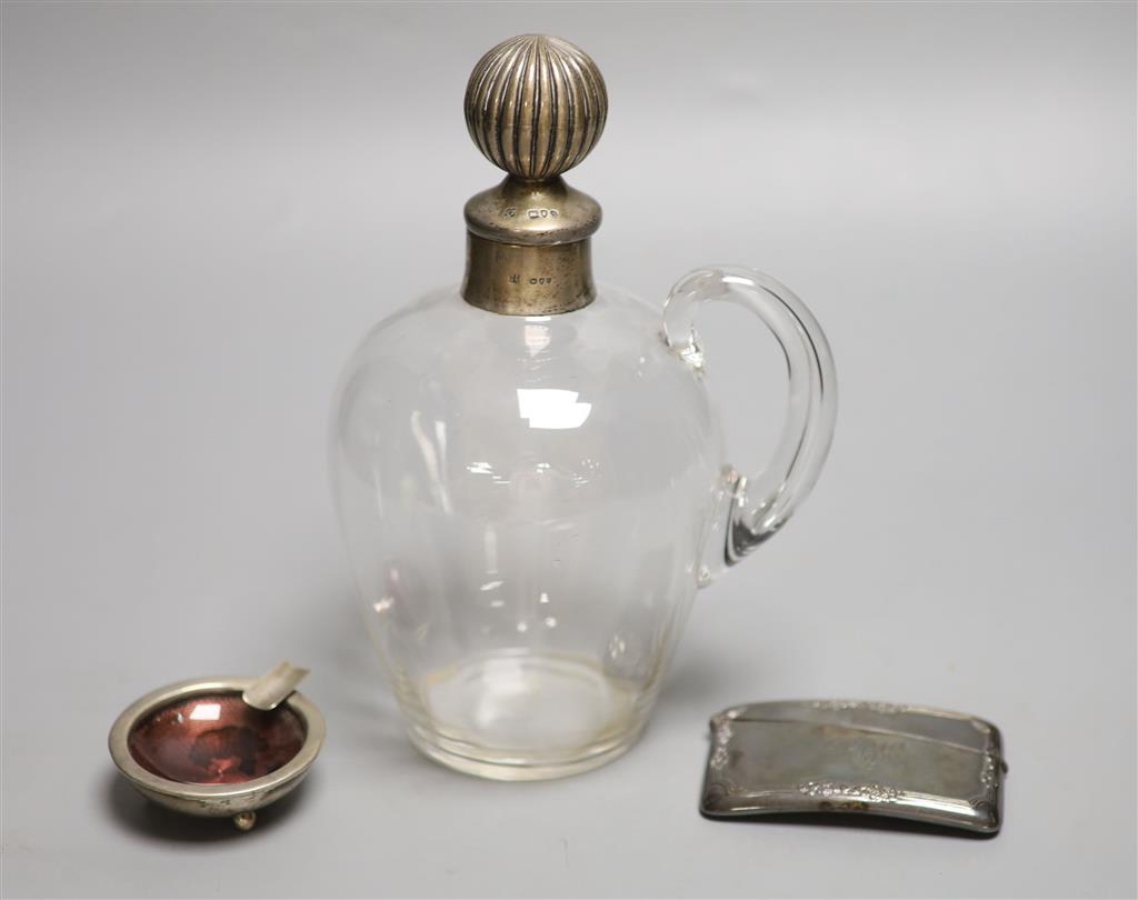 A late Victorian silver mounted glass decanter and stopper, London, 1893, 21.5cm, a silver card case and an ashtray.